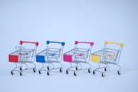 A row of shopping cartsDescription automatically generated
